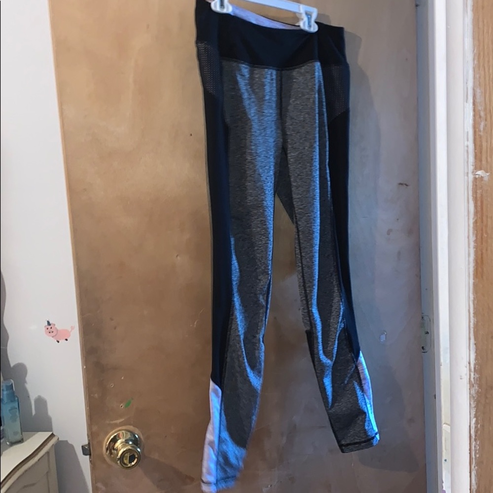 black, grey, and purple yoga pants